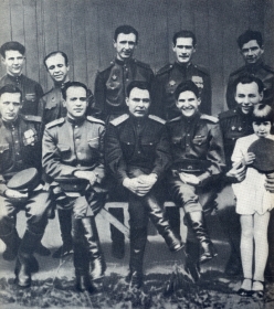 Major General L.I. Brezhnev among the soloists of the Song and Dance Ensemble of the Carpathian Military District. 1945. Photography. (- ..          . 1945. .) (Belyaev)